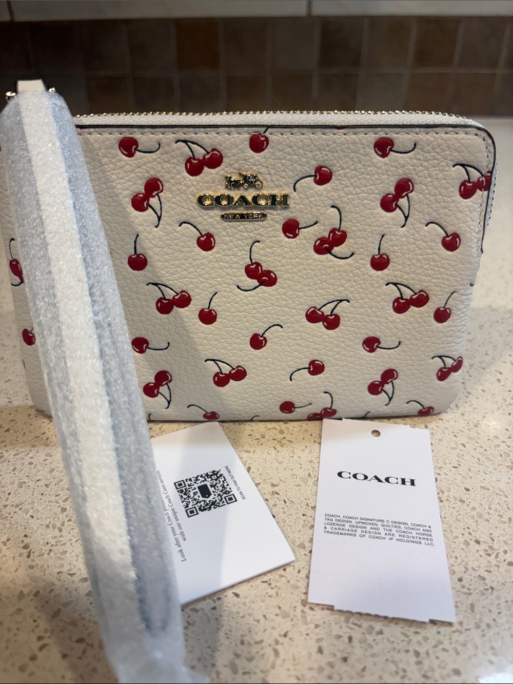 COACH NWT Cream Cherry Print Pebbled Leather Wristlet MSRP $75